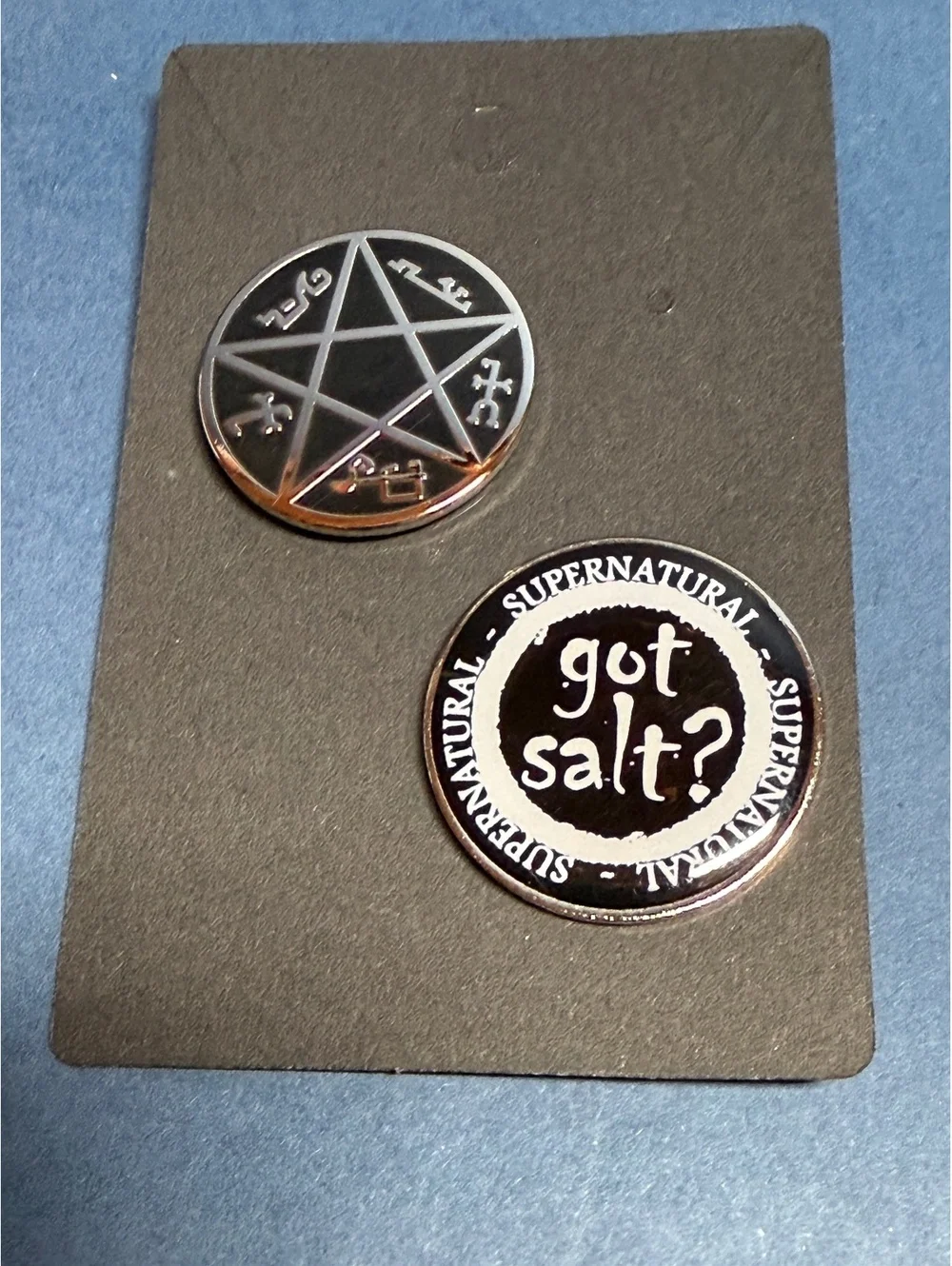 Pin set of 2. Supernatural Got Salt? & pentagram with symbols.